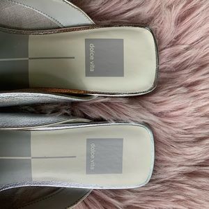 Sassy yet comfy metallic silver mules.